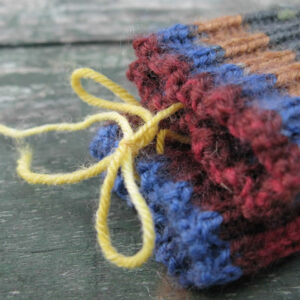 Colourful knitted socks in various sizes