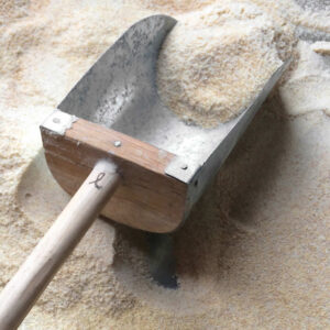 handmade flour scoop, made from metal and oak wood