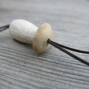 Handmade porcini necklaces made from oak wood and waxed thread