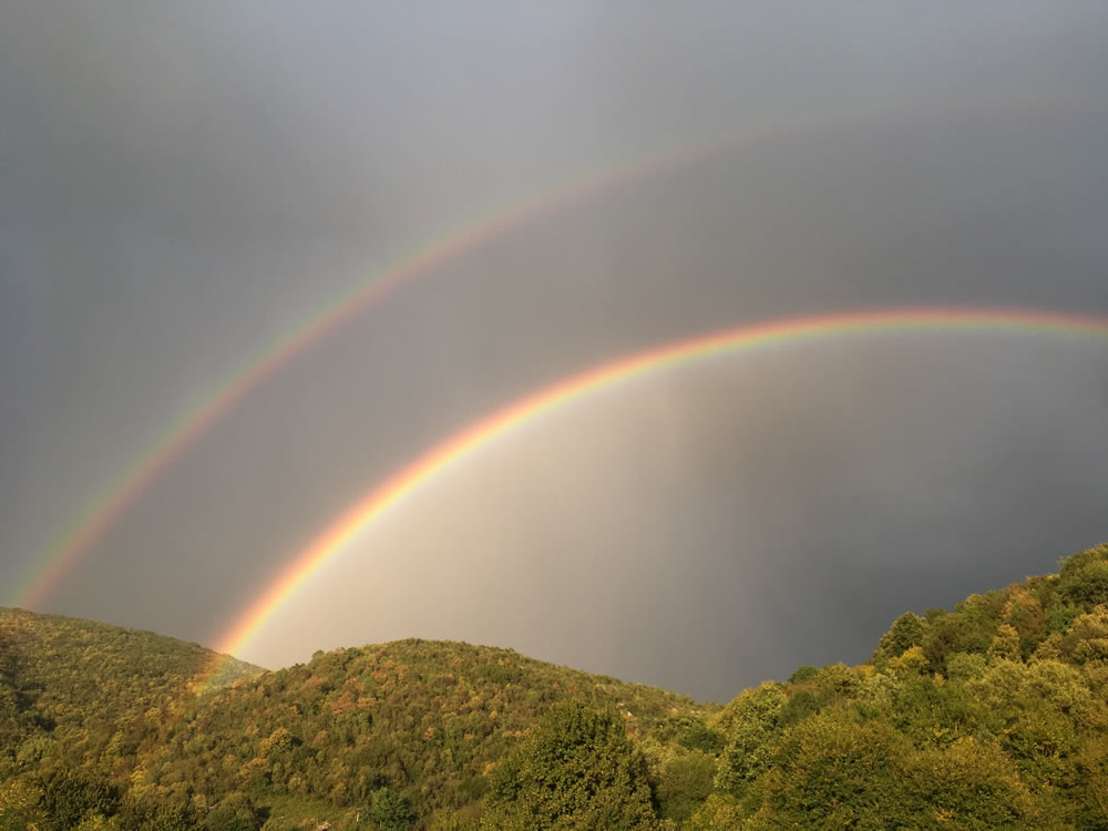 Amazing rainbow over Soudena (Pedina) Valley in Zagorochoria
